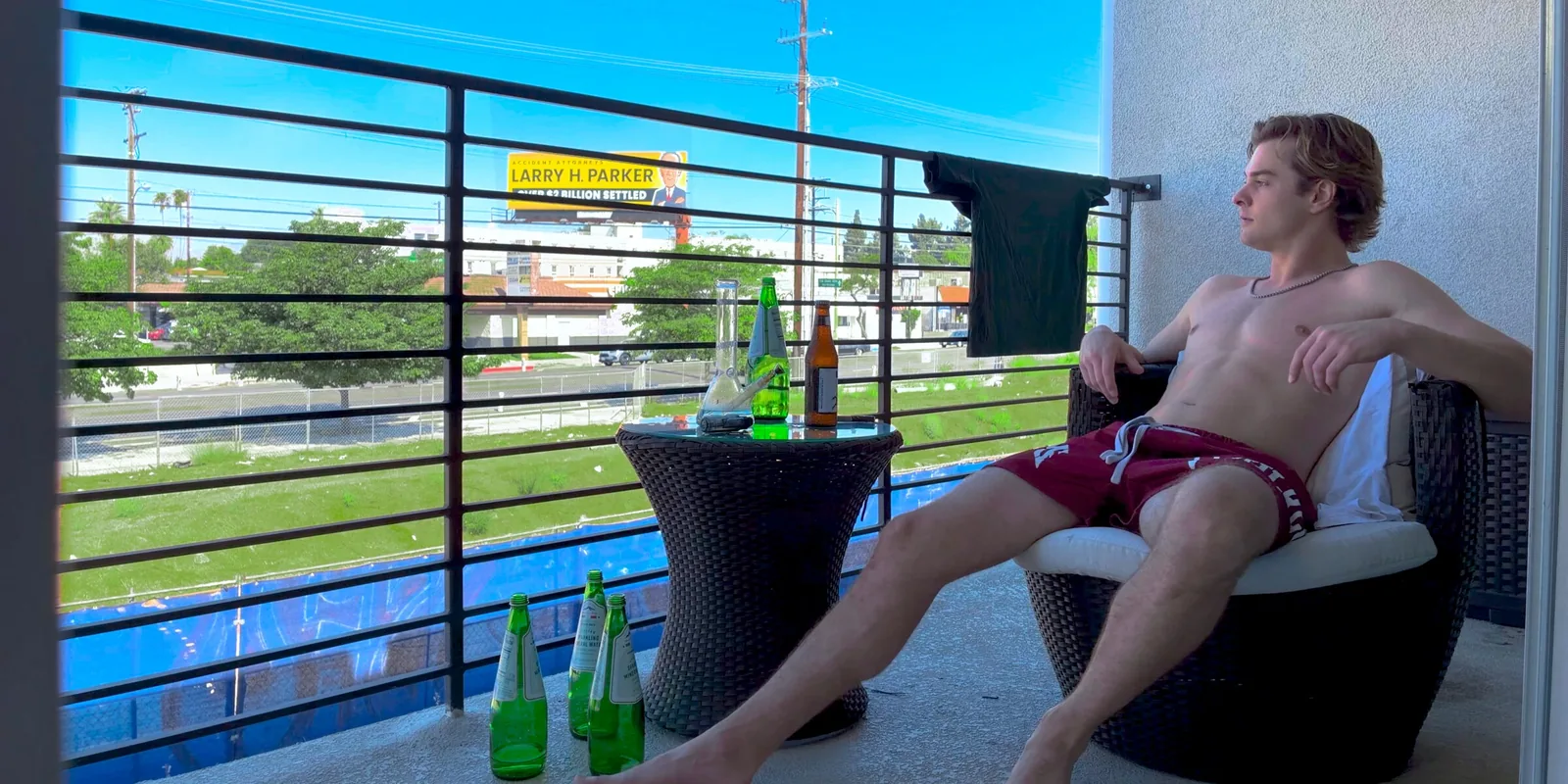 Eric Morrison seated on a sunlit Hollywood balcony
